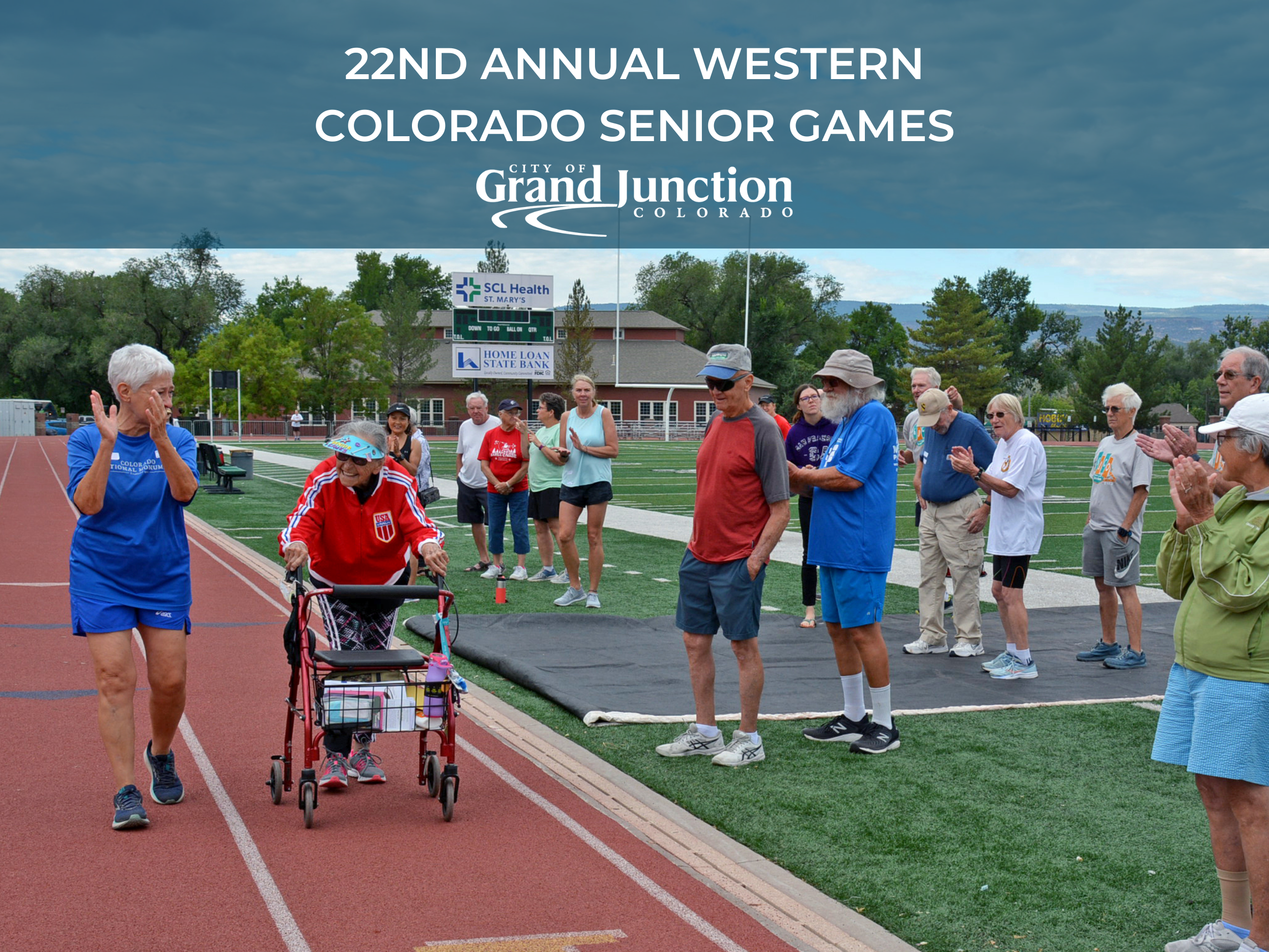 Group of community members gathering around a walking track. 