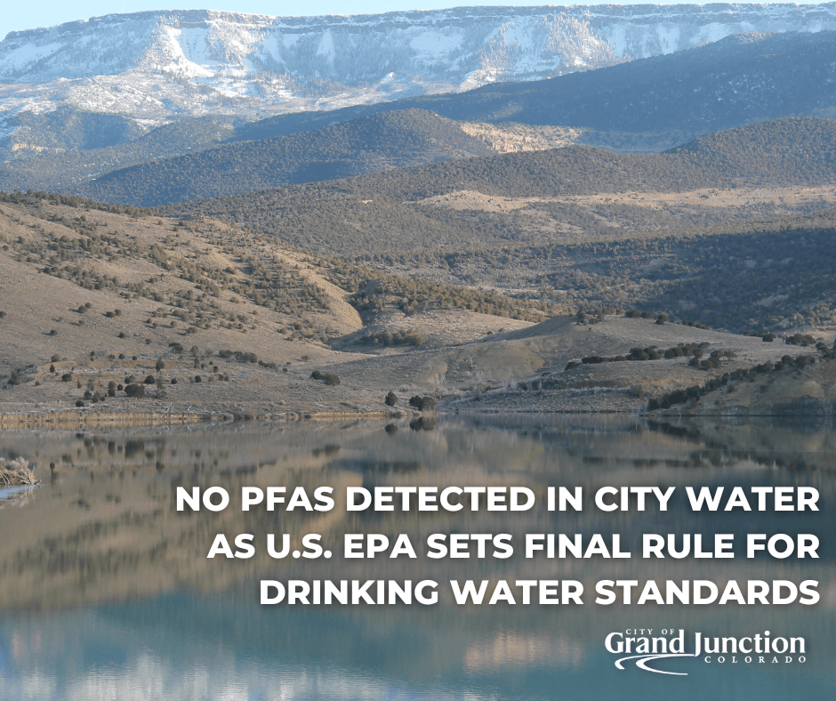 A lake with mountains in the background. Text on graphic.