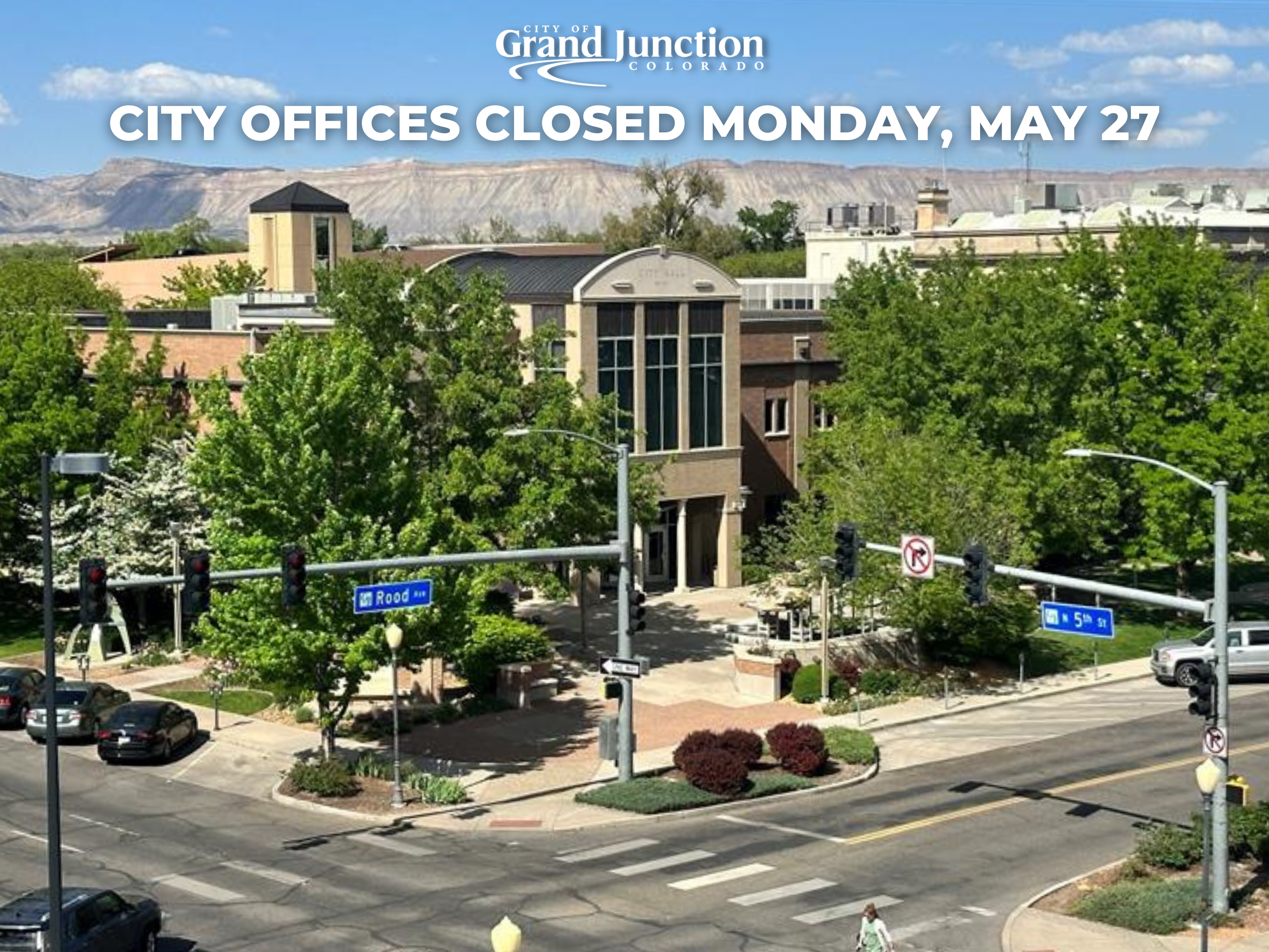 An ariel photograph of City Hall with trees surrounding the building. Text on graphic.
