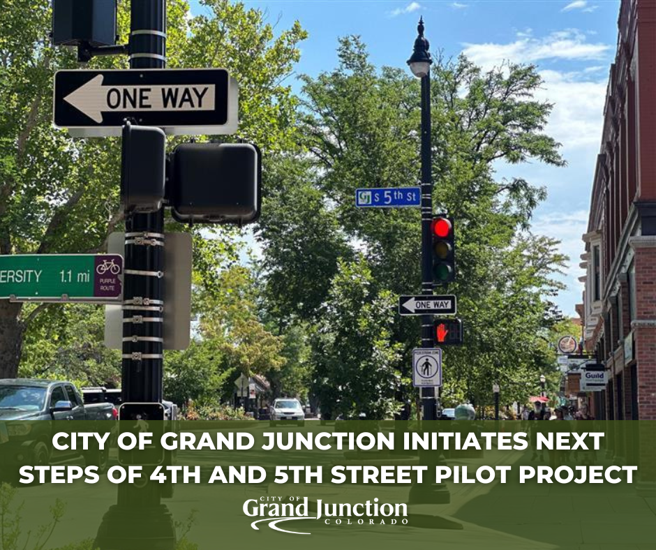 A street with signs and stoplight. Text on graphic. 