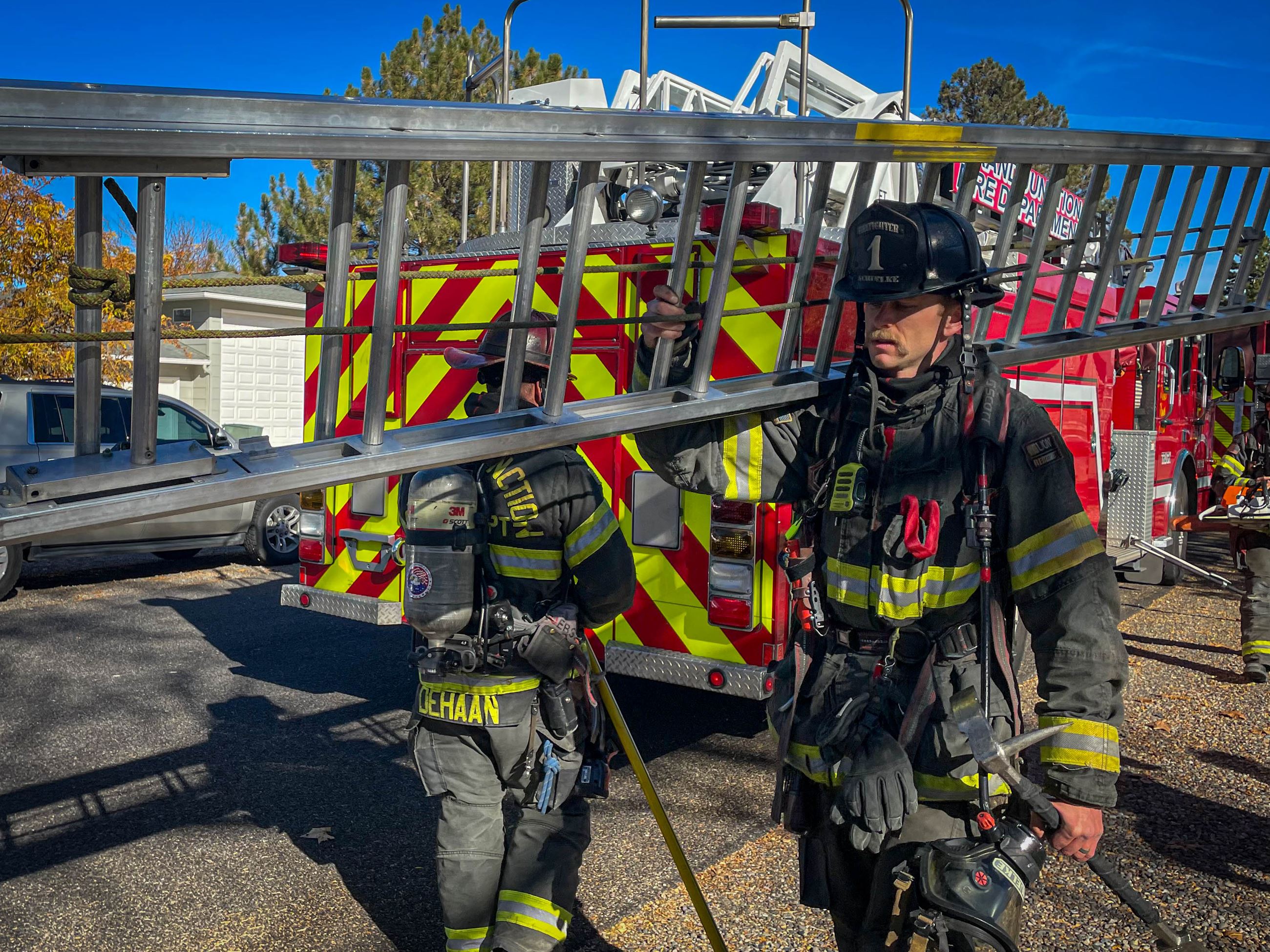 Firefighters extinguish a fire on Sacoma Court