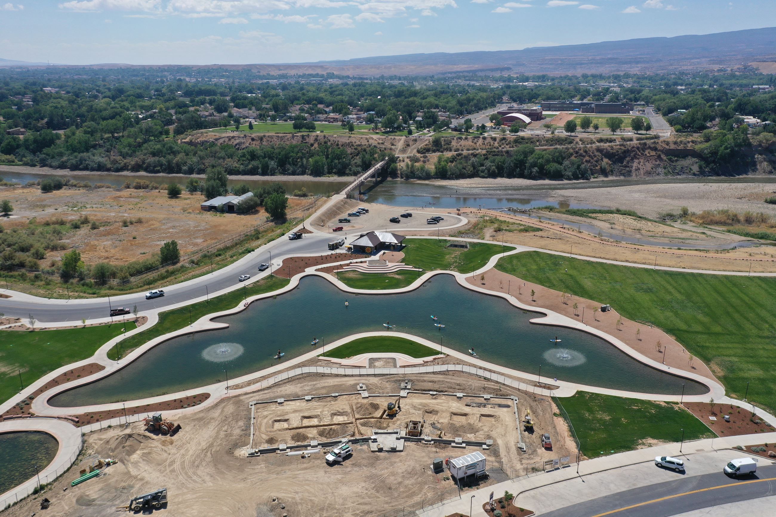 A birds eye view of a pond shaped like a butterfly