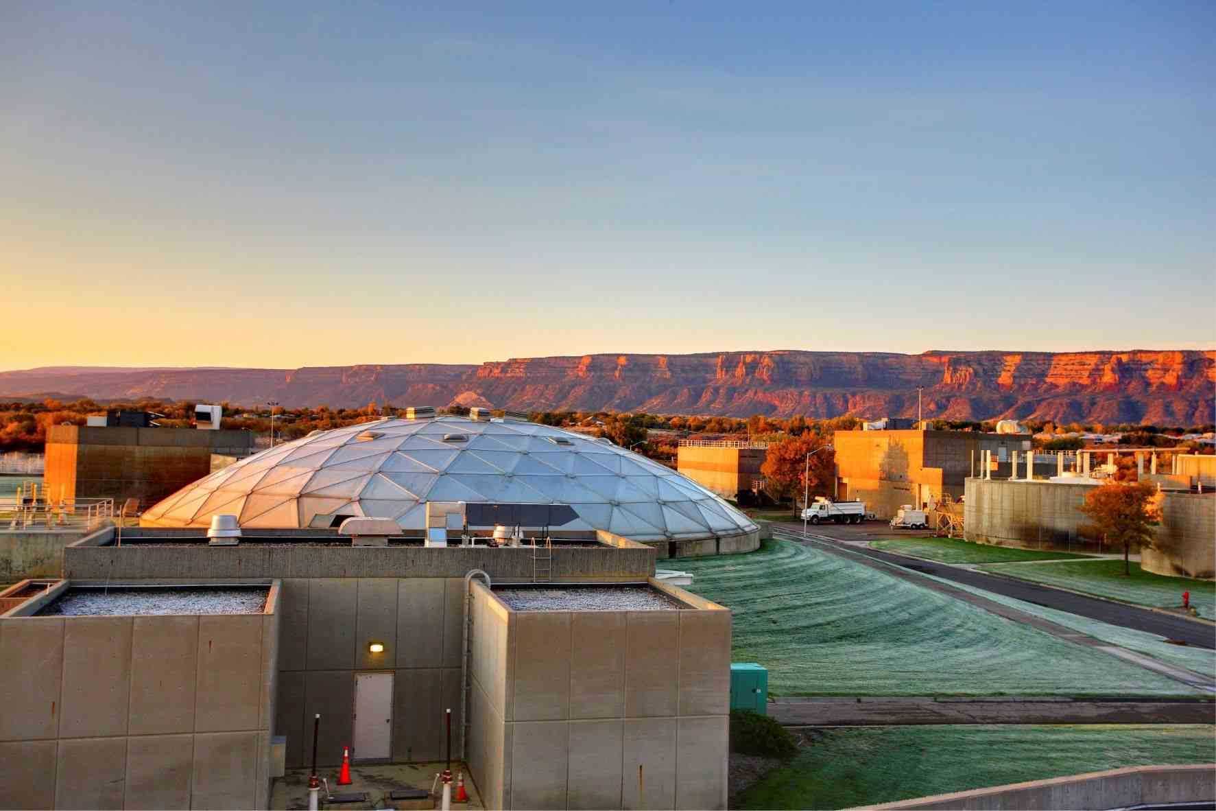 The Persigo Wastewater Plant lit up by an early morning sunrise
