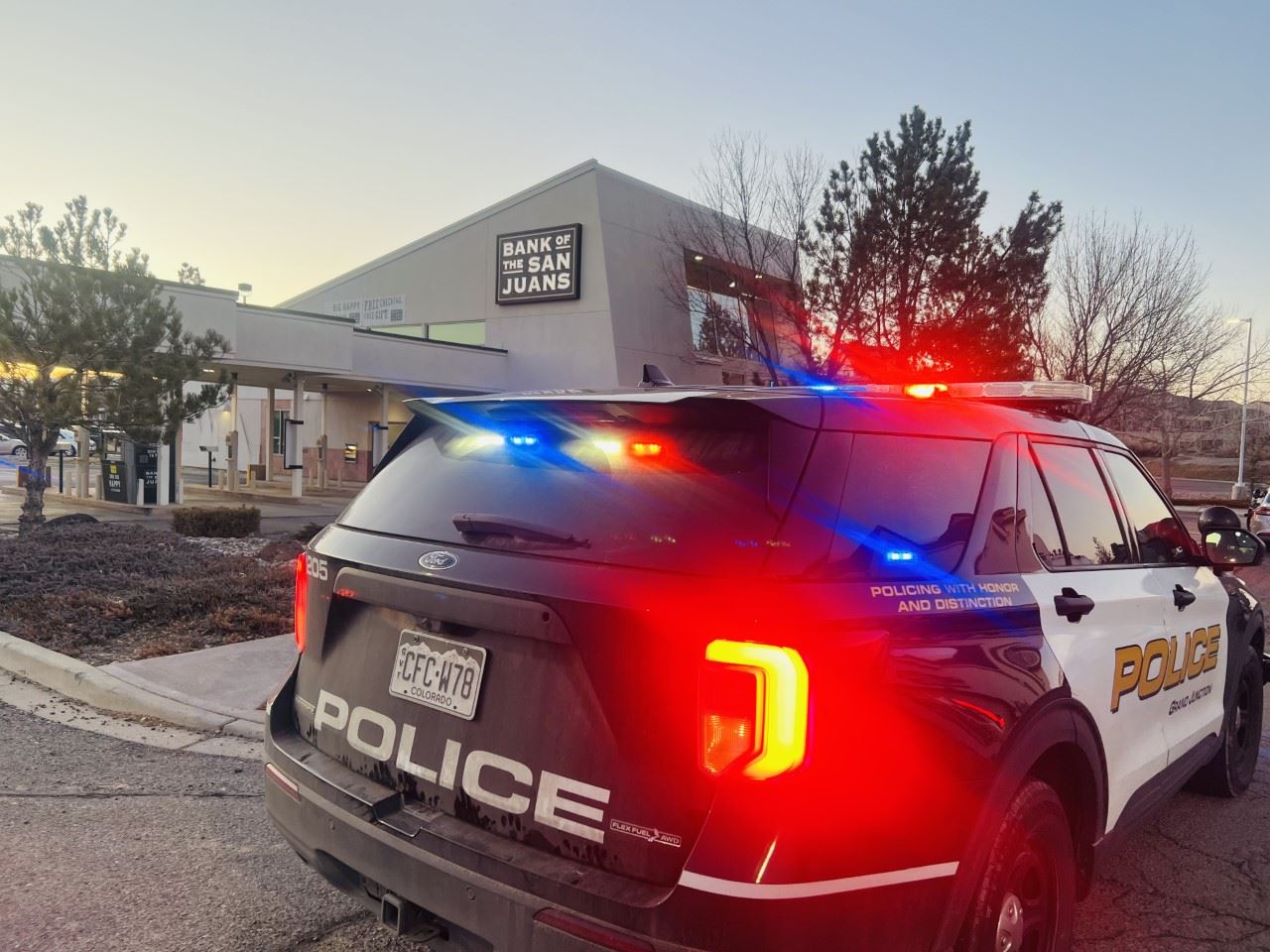 Patrol vehicle in front of Bank 
