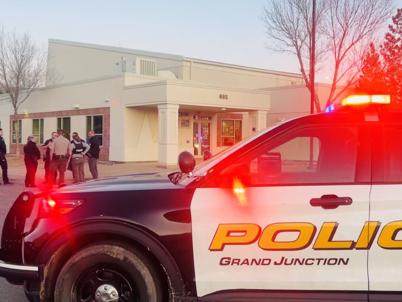 GJPD patrol car in front of bank