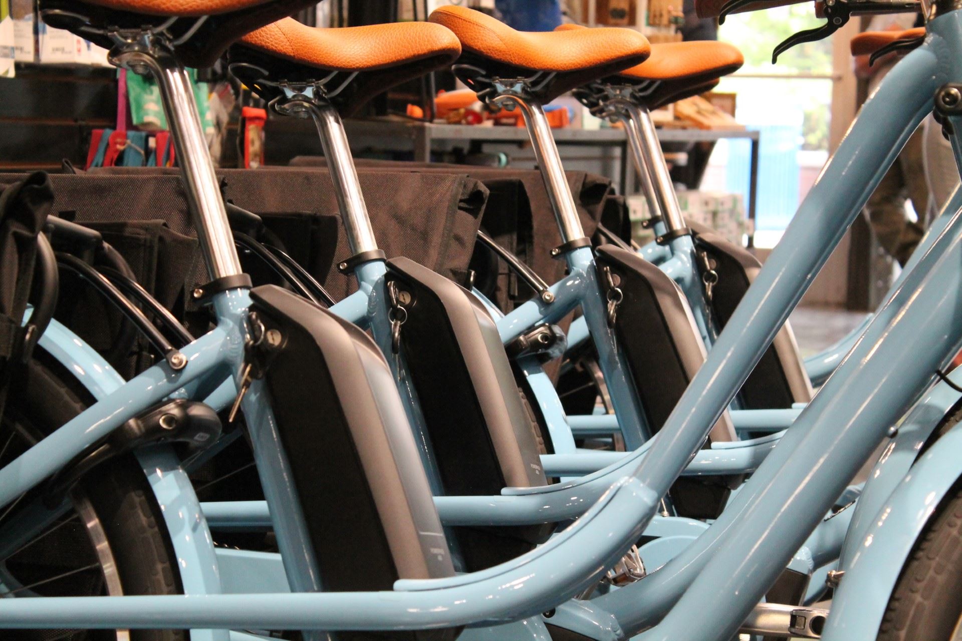 A row of ebikes stands in the Gear junction shop.